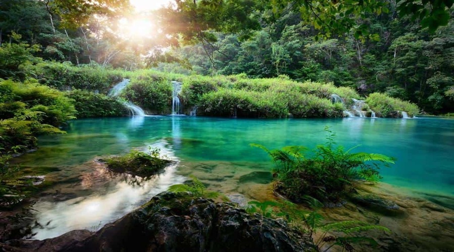 Cascades-National-Park-in-Guatemala-Semuc-Champey-at-sunset-