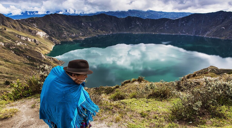 Ecuadorian woman walking near the Quilotoa Volcano