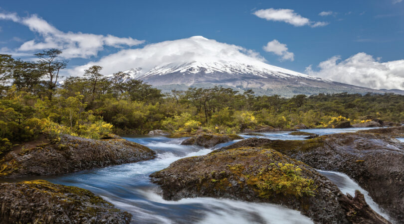 Landscape-of-the-Osorno-volcano-with-the-Petrohue-waterfalls-and-river-in-the-foreground-in-the-lake-district-near-Puerto-Varas-and-Puerto-Montt-South-Chile