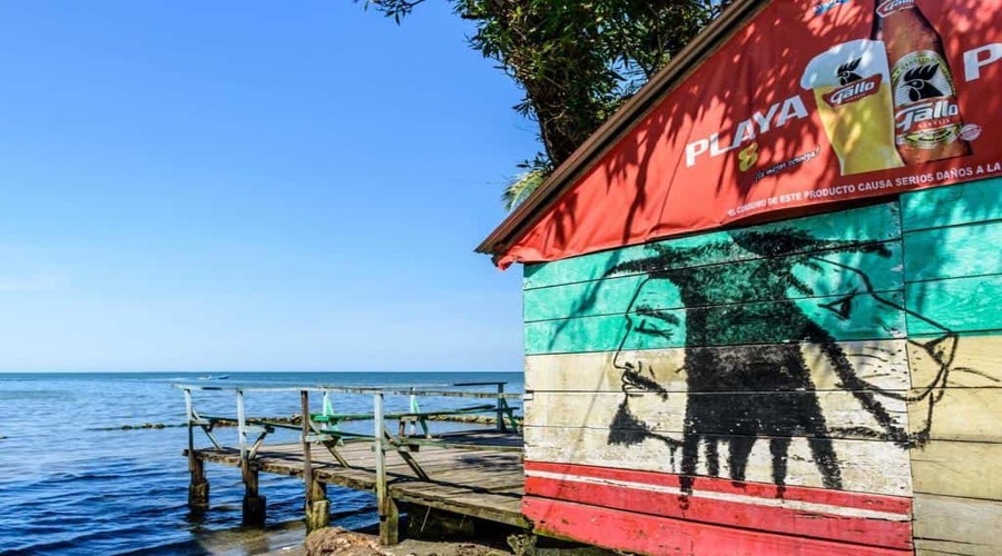 Painted-wooden-wall-of-beachside-bar-in-Caribbean-town-of-Livingston-Guatemala