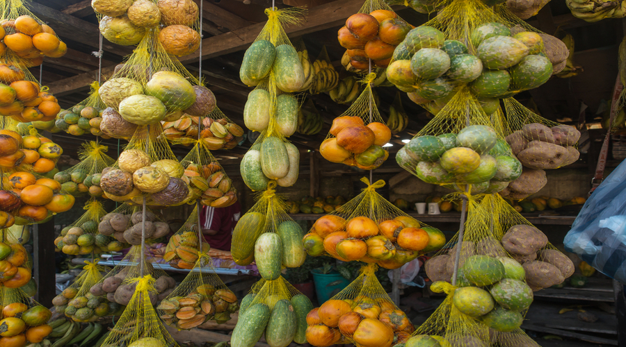 Tasty-fresh-colorful-fruit-hanging-on-a-market-stall-in-a-small-town-Leticia