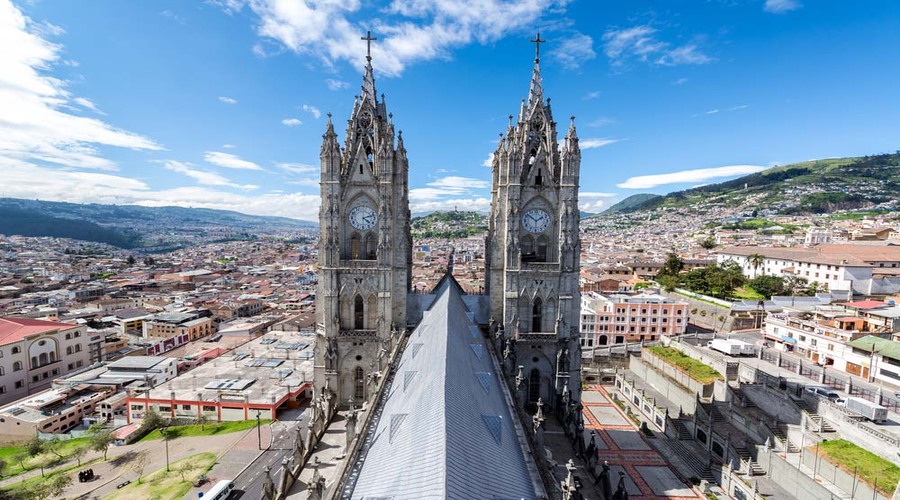 View-of-the-towers-of-the-Basilica-in-Quito-Ecuador-with-the-city-visible-in-the-background