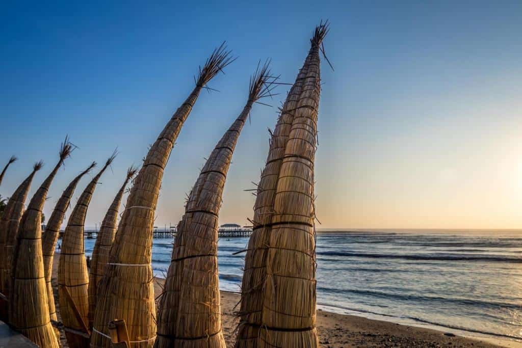 
Huanchaco-Beach-and-the-traditional-reed-boats-caballitos-de-totora-Trujillo-Peru