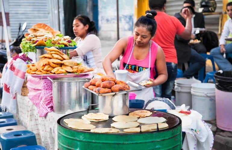 Mayan-women-sell-Guatemalan-food-at-the-street-of-Guatemala-city