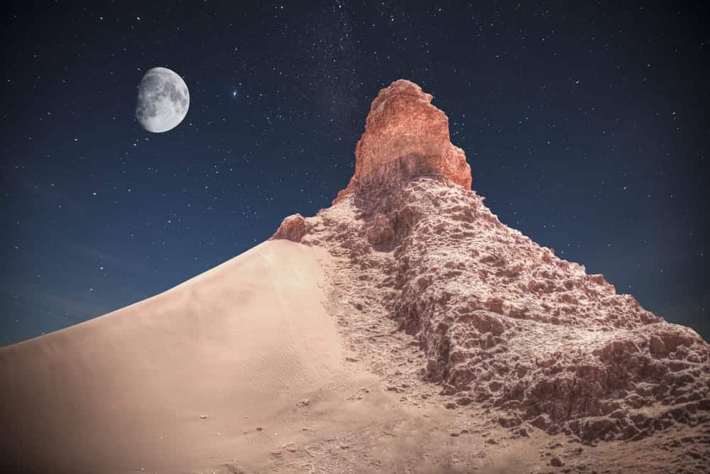 Valle de la Luna (Moon Valley) close to San Pedro de Atacama, Chile. night shining stars