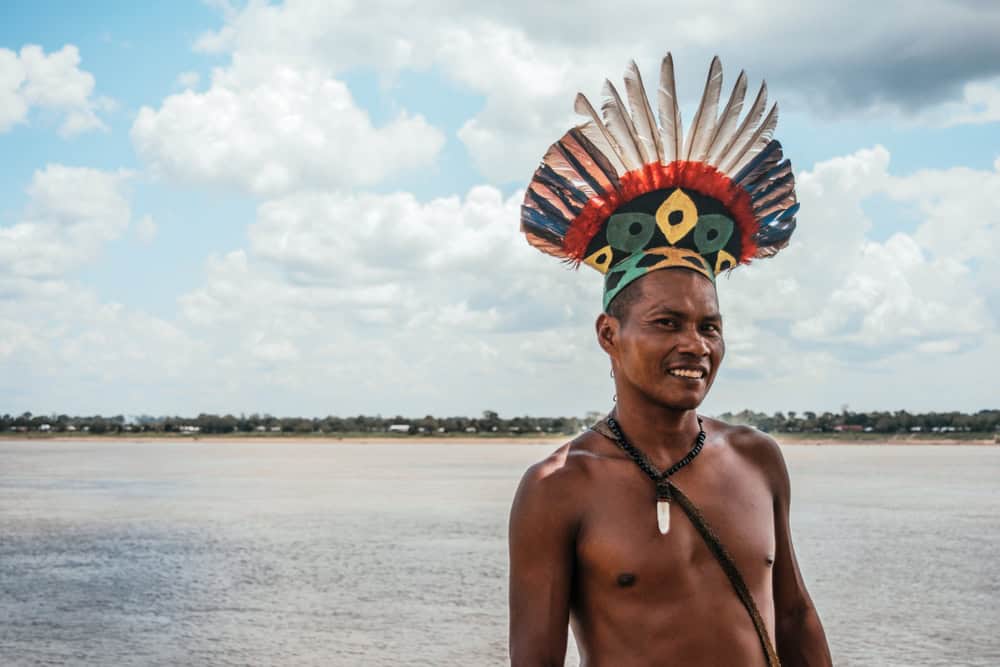 Tikuna-man-in-front-of-amazon-river