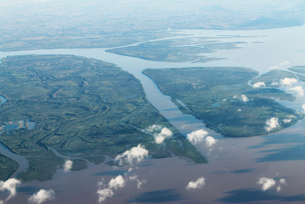 Aerial view from an airplane at the mouth of the Paraná Delta in the Río de la Plata, Buenos Aires, Argentina