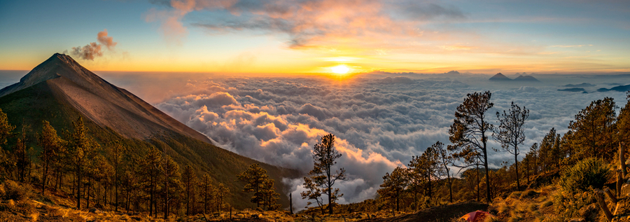 Panoramic-Hiking-to-Volcano-in-Guatemala-Above-Clouds-at-Sunset-with-Sky-View-and-Trees-in-Nature-Park