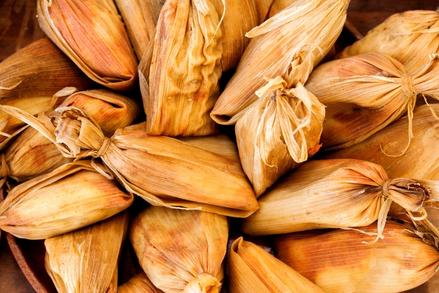 Small-tamales-called-Chuchitos-typical-Guatemalan-food-made-of-corn-dough-and-meat-with-a-sauce-called-recado-traditional-diet